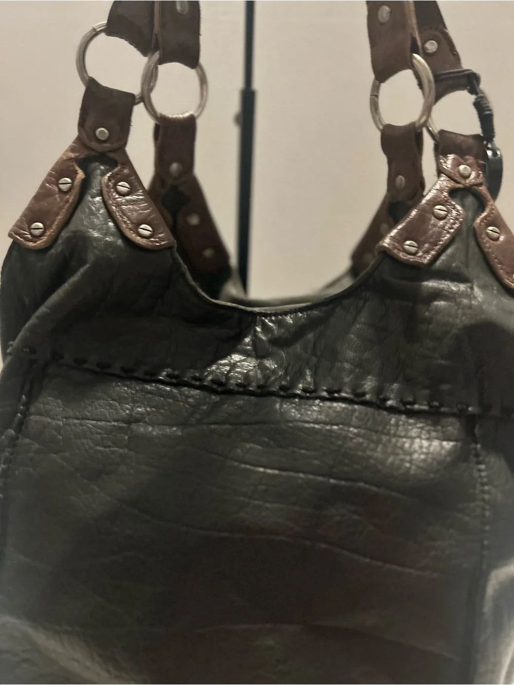 The Sak Black Leather Hobo Bag with Brown Trim